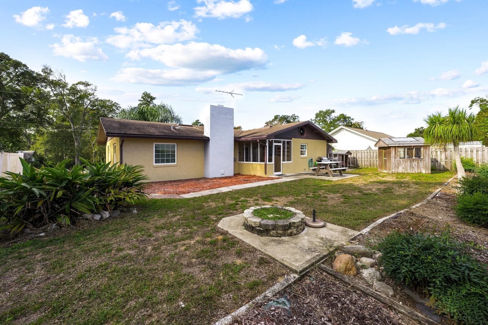 345 Cypress Road St. Augustine, FL 32086 - Photo 35 of 56 a front view of a house with garden