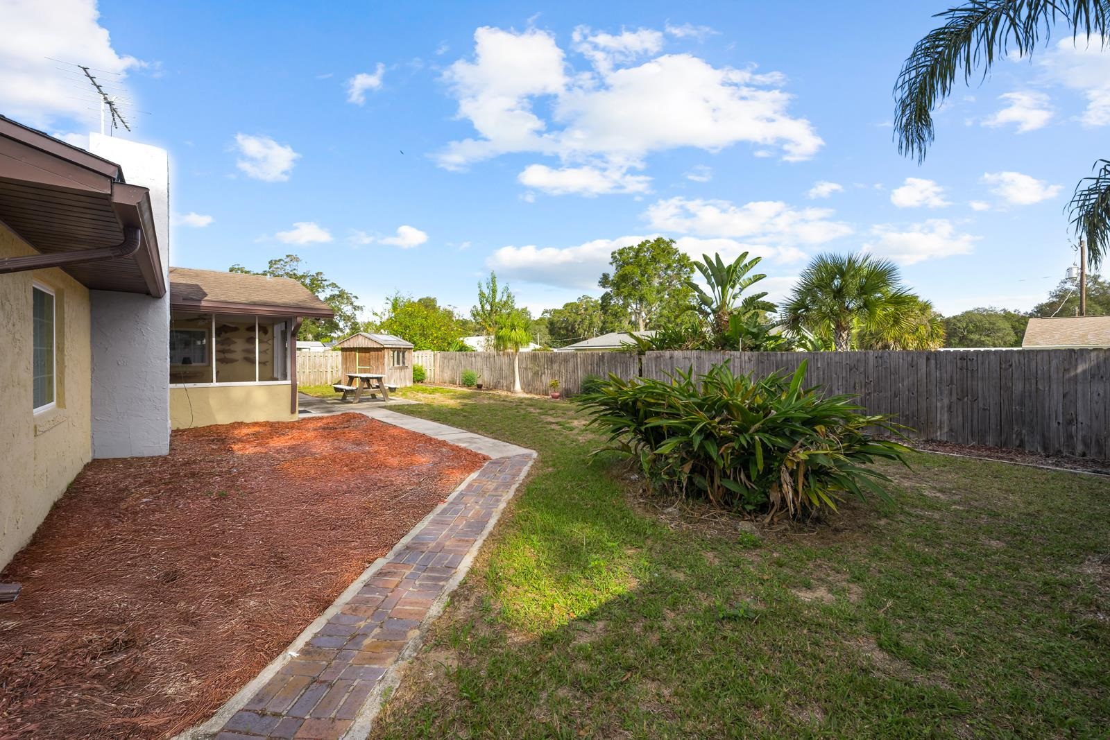 345 Cypress Road St. Augustine, FL 32086 - Photo 36 of 56 Fenced backyard with a sunroom