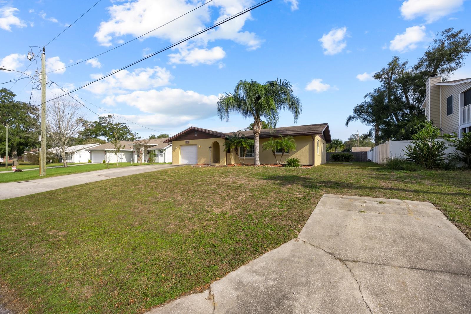 345 Cypress Road St. Augustine, FL 32086 - Photo 37 of 56 a front view of a house with a yard