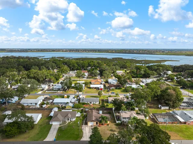 an aerial view of a house with a garden