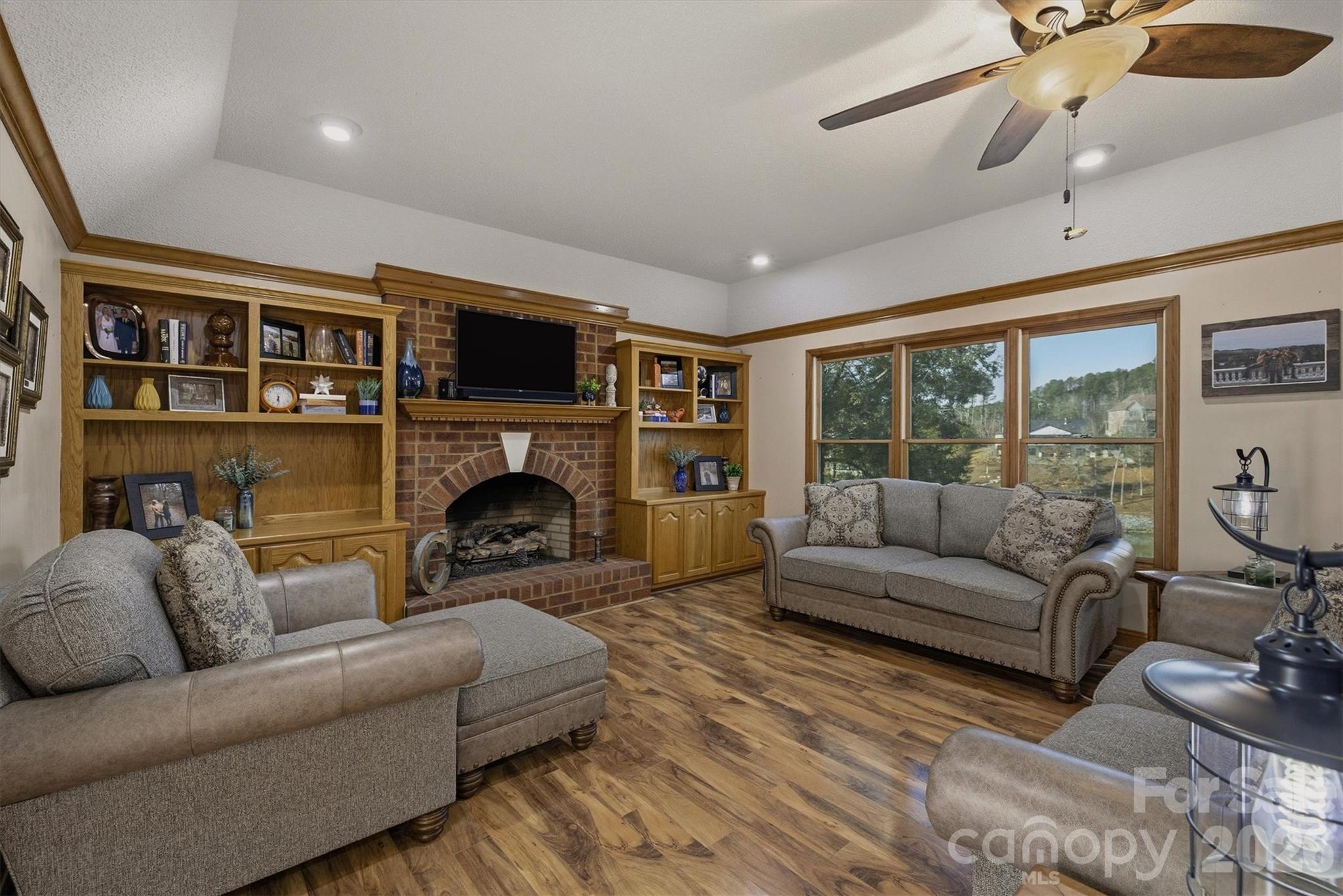 46 Mariners Point Lane Hickory, NC 28601 - Photo 14 of 43 a living room with furniture flat screen tv and a fireplace