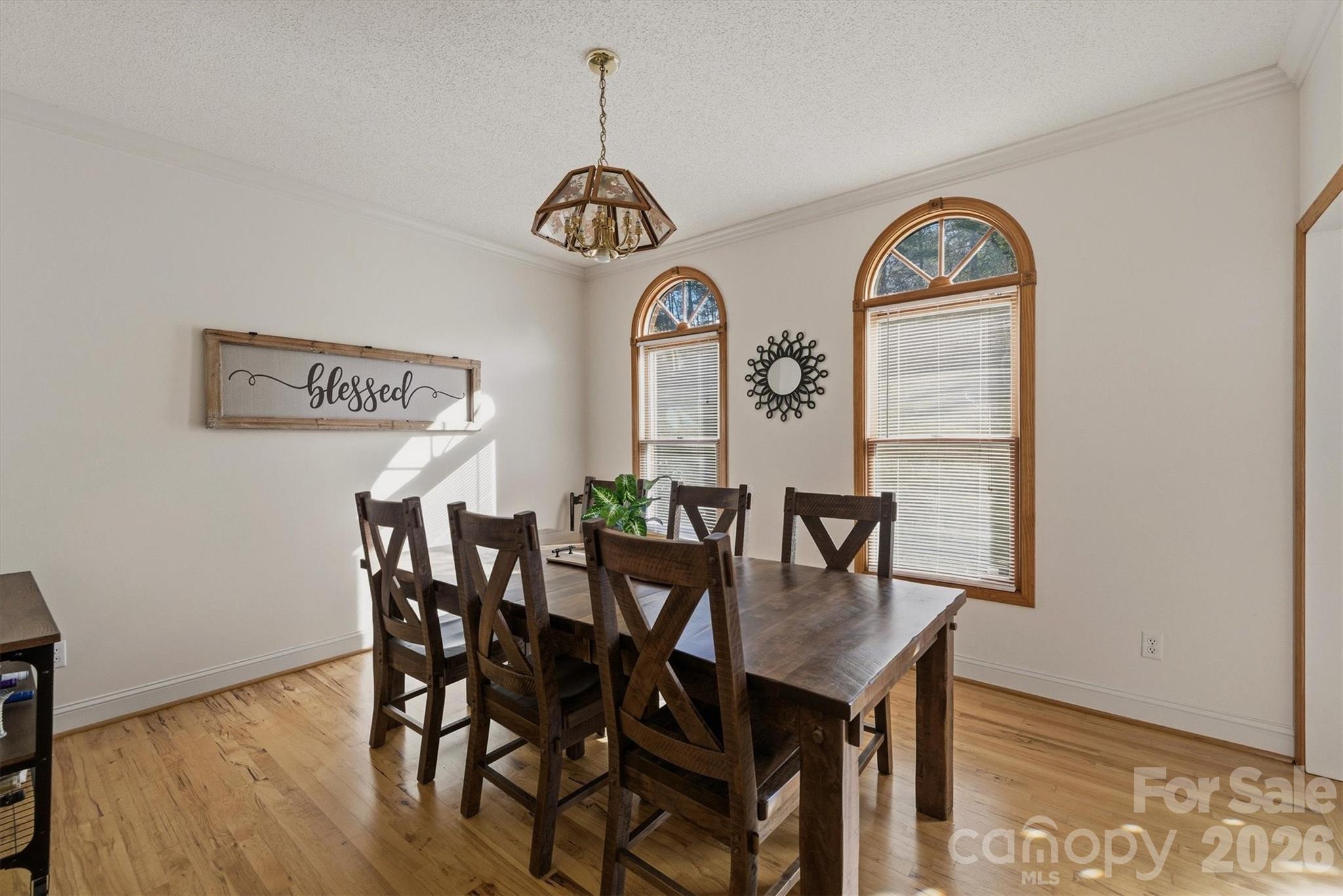 46 Mariners Point Lane Hickory, NC 28601 - Photo 22 of 43 a view of a dining room with furniture and wooden floor