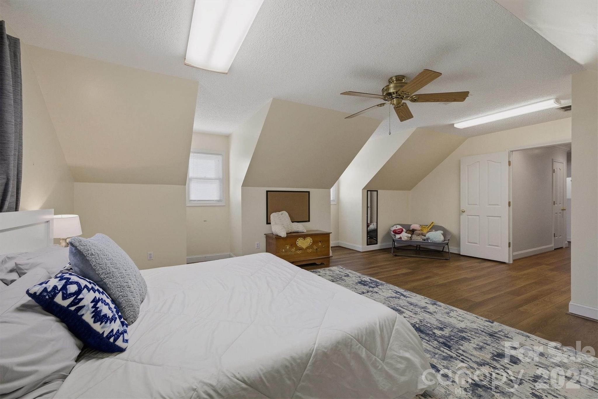 46 Mariners Point Lane Hickory, NC 28601 - Photo 34 of 43 a bedroom with a bed and a couch