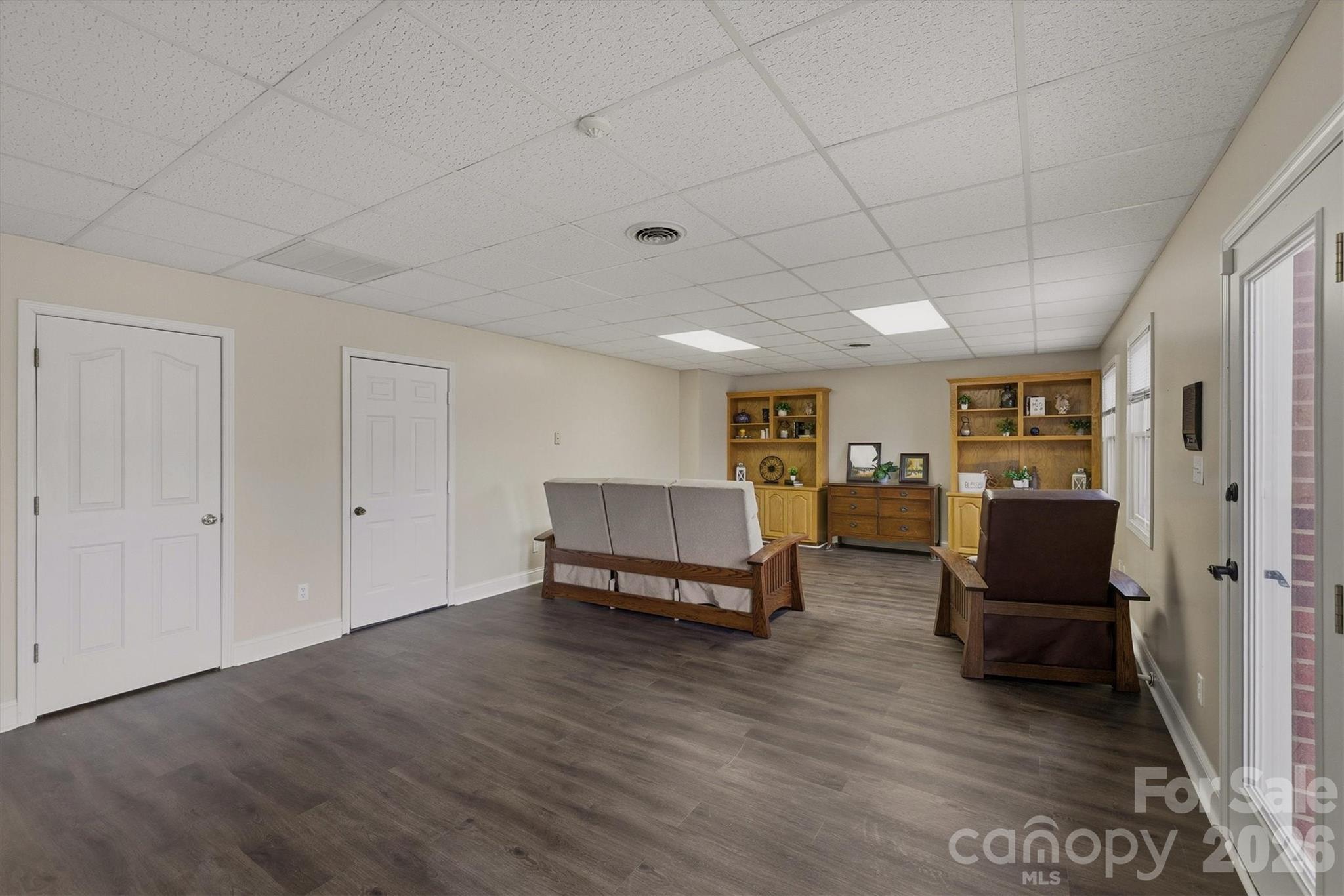 46 Mariners Point Lane Hickory, NC 28601 - Photo 38 of 43 a living room with furniture and a wooden floor