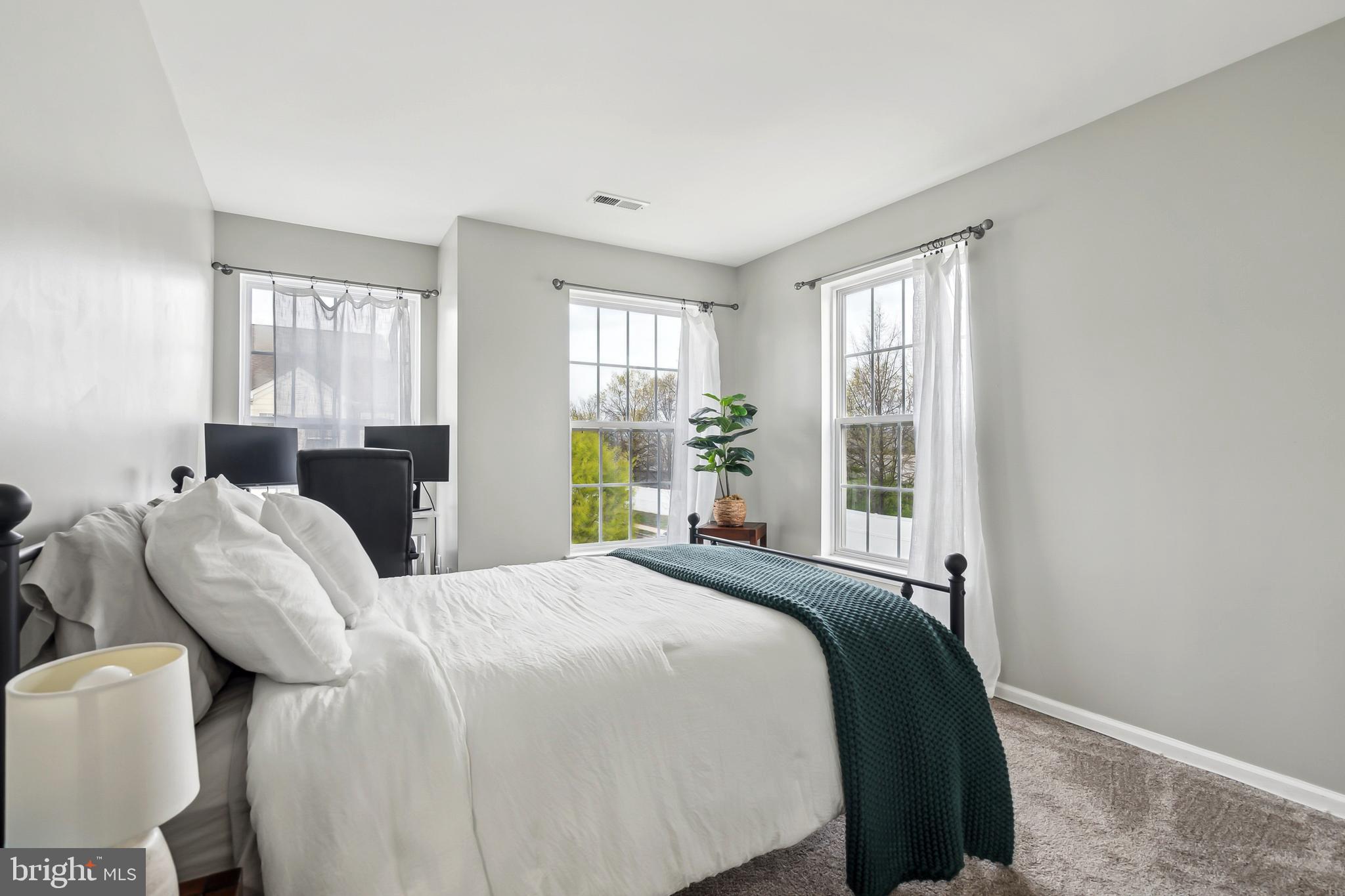 28 Teal Court Riverside, NJ 08075 - Photo 19 of 24 a bedroom with a bed window and couch