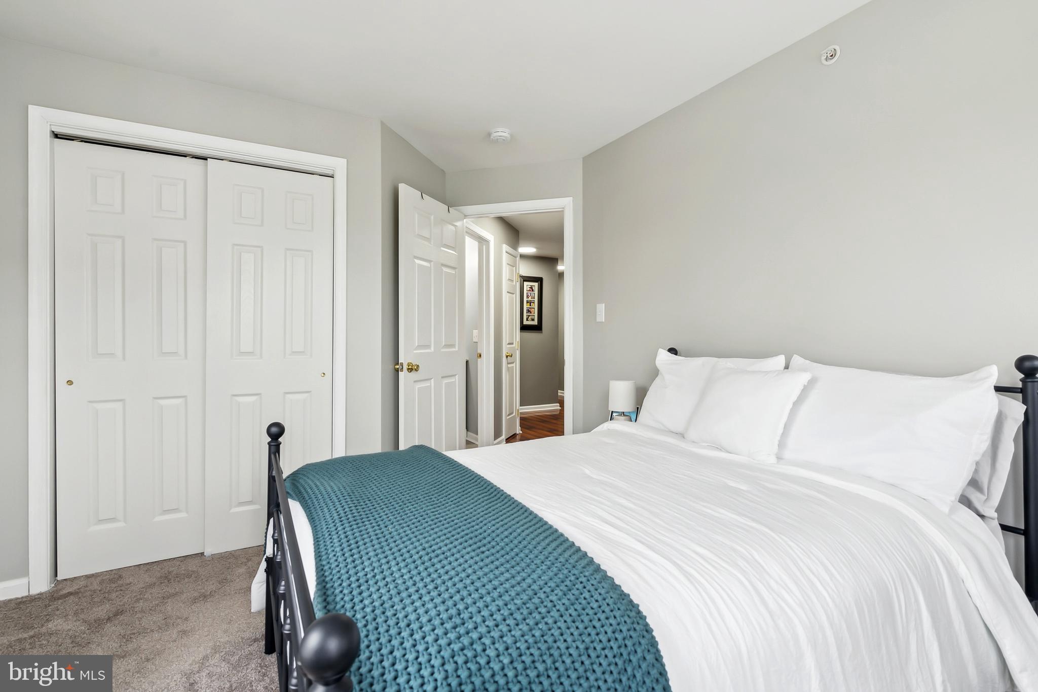 28 Teal Court Riverside, NJ 08075 - Photo 20 of 24 a bedroom with a bed and a window