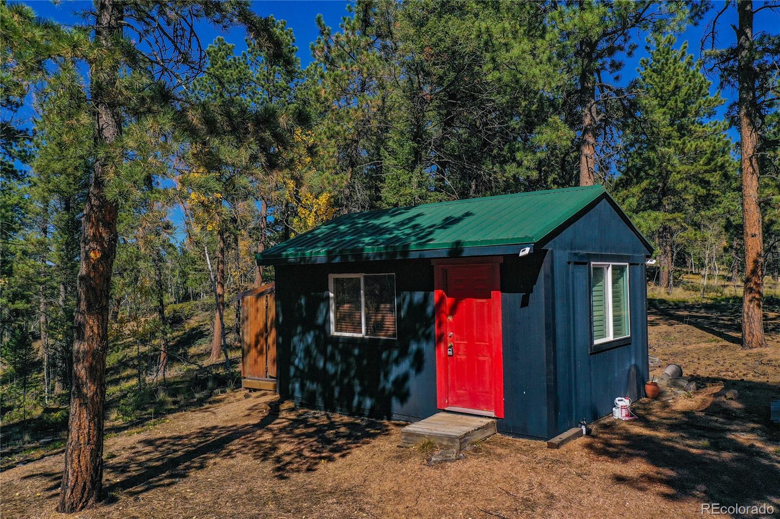 3447 Pathfinder Road Florissant, CO 80816 - Photo 2 of 40 a view of outdoor space and yard