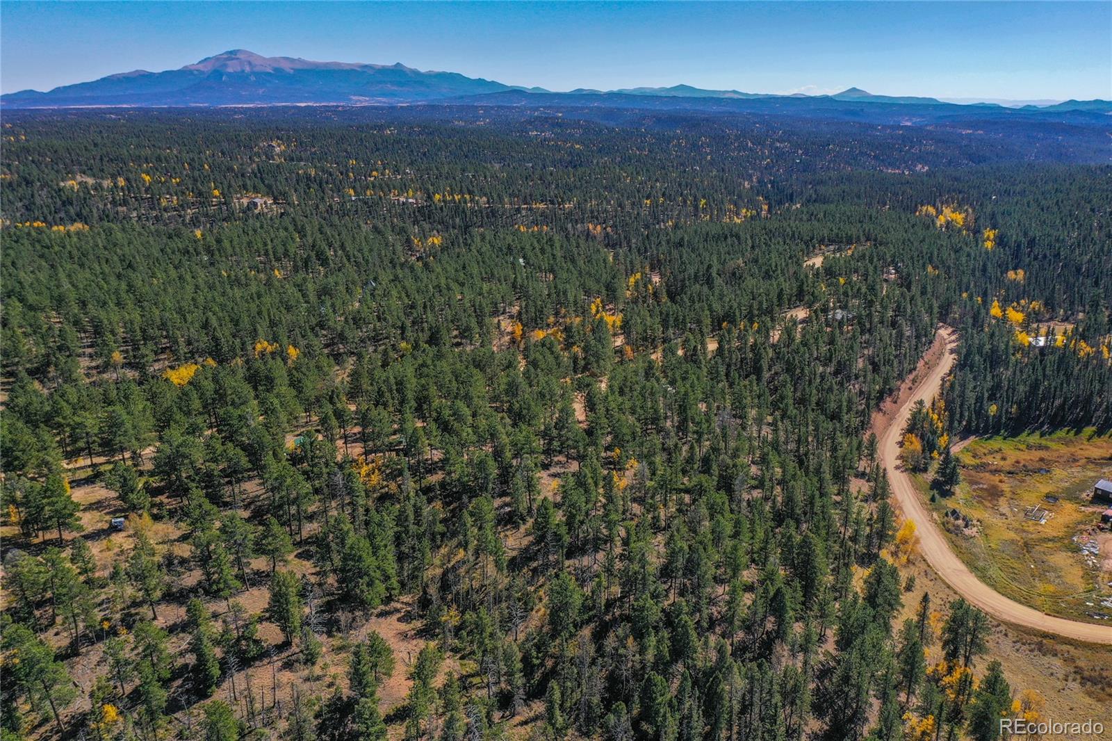 3447 Pathfinder Road Florissant, CO 80816 - Photo 3 of 40 a view of city and mountain