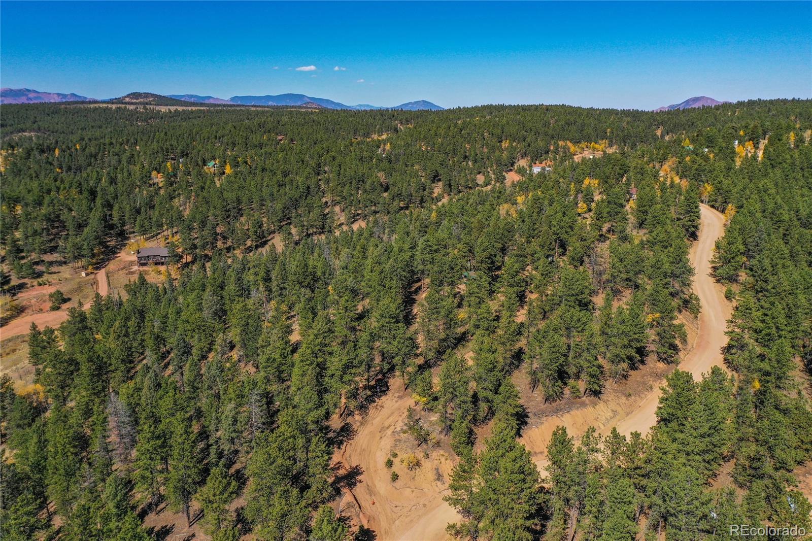 3447 Pathfinder Road Florissant, CO 80816 - Photo 35 of 40 a view of a city with mountains