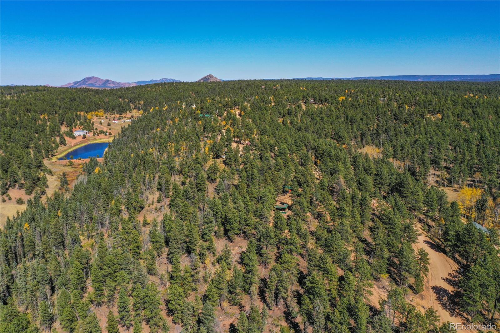 3447 Pathfinder Road Florissant, CO 80816 - Photo 37 of 40 a view of city and mountain