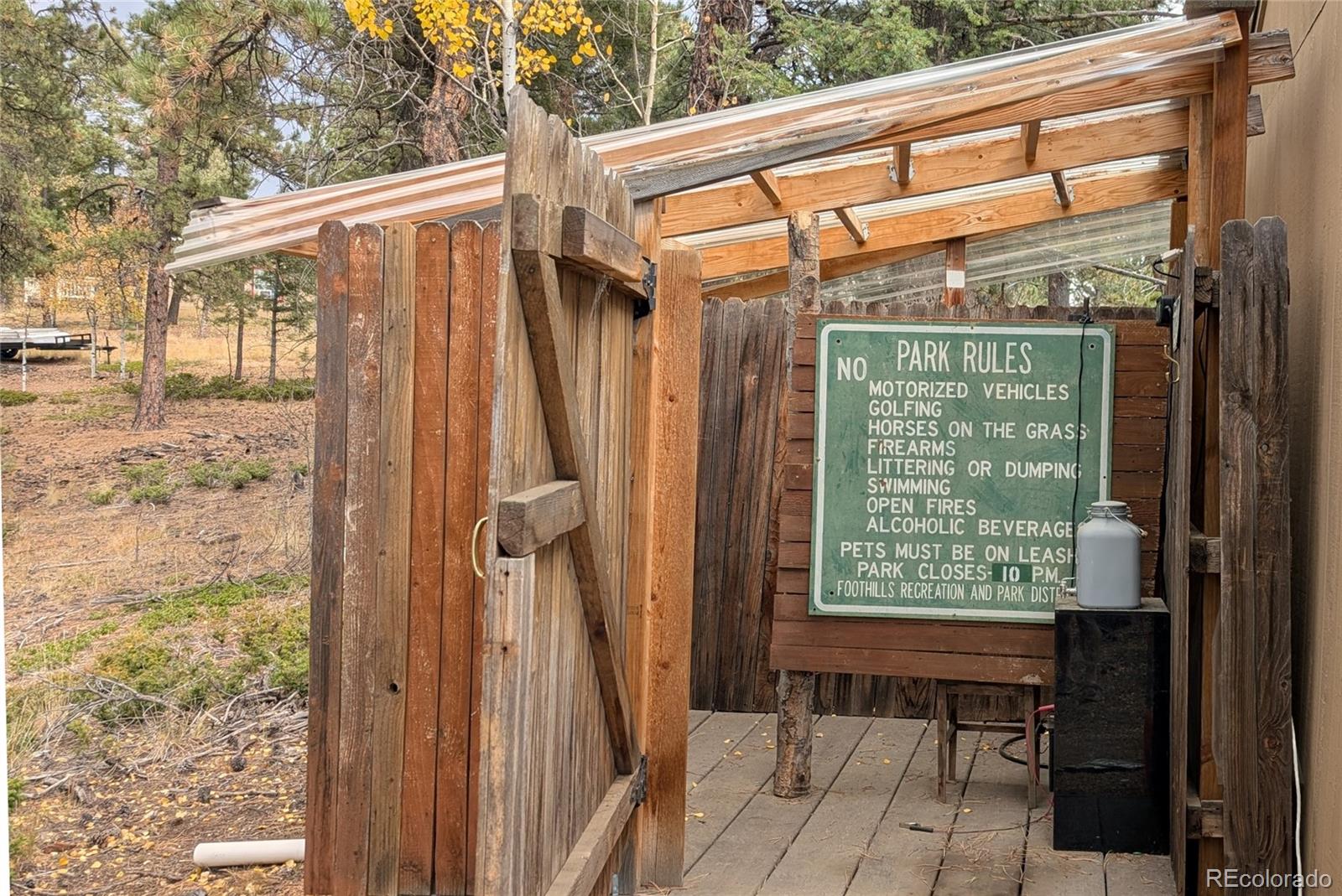 3447 Pathfinder Road Florissant, CO 80816 - Photo 4 of 40 a view of a two chairs in the balcony