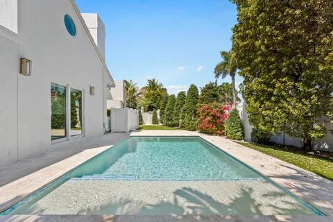 a view of a backyard of the house