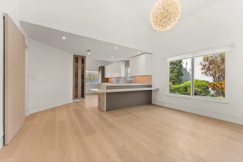 a view of kitchen and front door