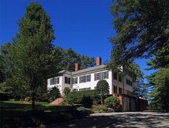 67 Sandy Pond Road Lincoln, MA 01773 - Photo 1 of 21 a front view of a house with a yard