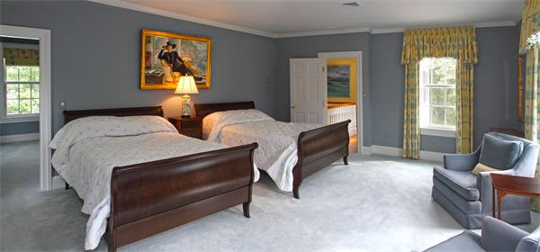 67 Sandy Pond Road Lincoln, MA 01773 - Photo 12 of 21 a bedroom with a bed and a couch