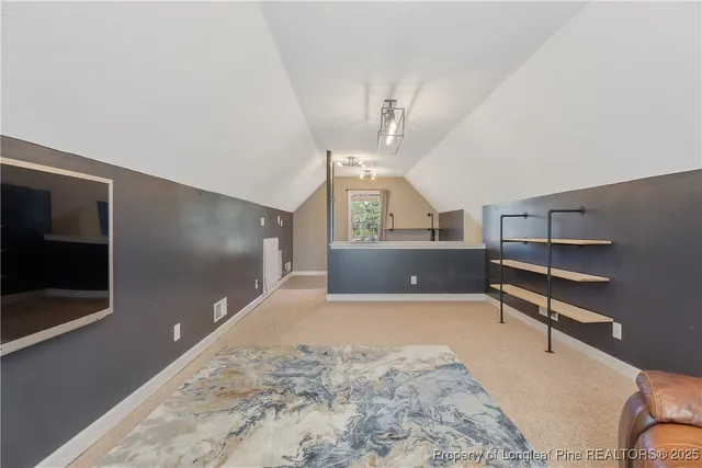 a view of a livingroom with furniture and window