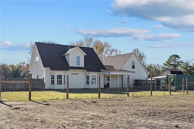 a view of a house with a park