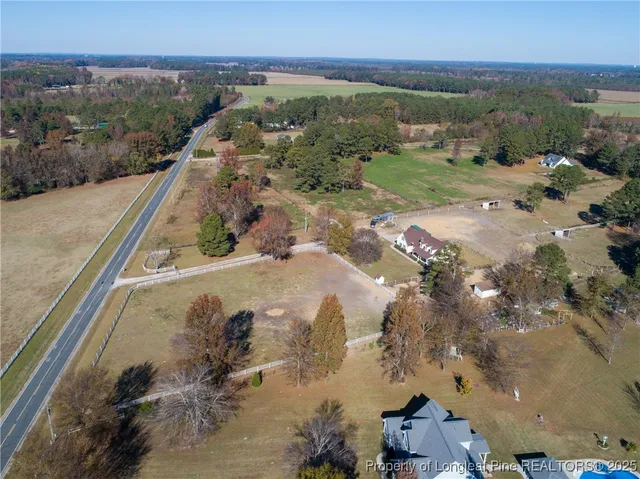 an aerial view of a houses with outdoor space