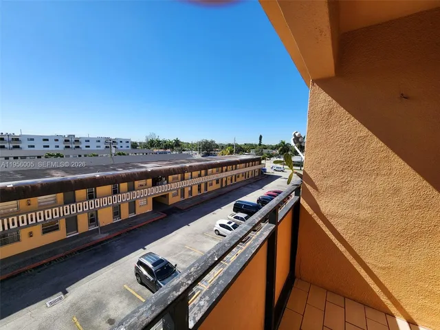 a view of a balcony with city view