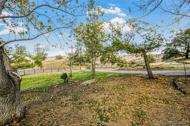 a view of backyard with green space