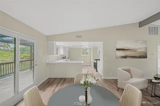 a room with furniture and a large window