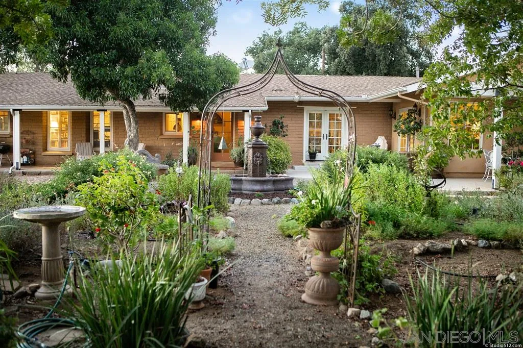 15738 Vesper Road Valley Center, CA 92082 - Photo 2 of 25 front view of a house with a yard