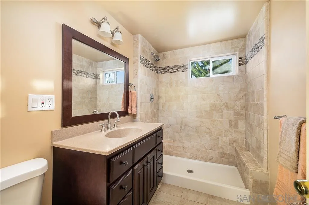 15738 Vesper Road Valley Center, CA 92082 - Photo 21 of 25 a bathroom with a sink a toilet and shower