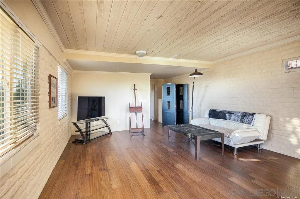 15738 Vesper Road Valley Center, CA 92082 - Photo 22 of 25 a living room with furniture and a wooden floor