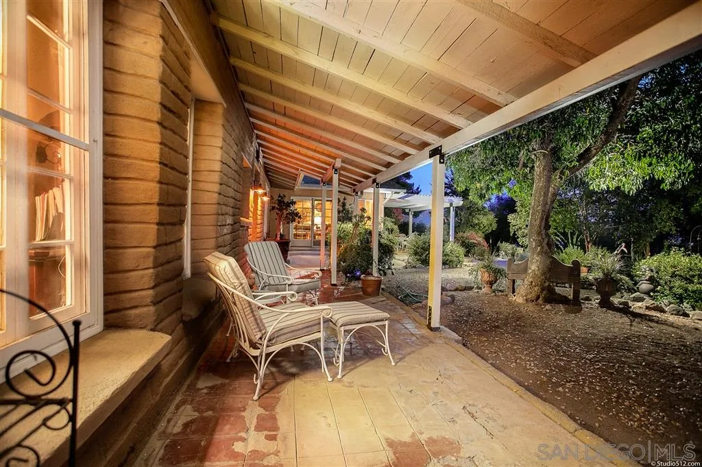 15738 Vesper Road Valley Center, CA 92082 - Photo 5 of 25 a view of a patio with table and chairs and potted plants