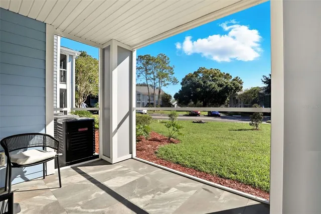 a couple of chairs in front of door