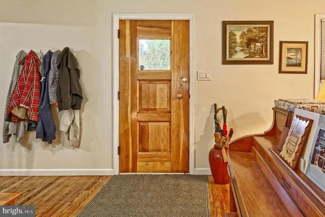 a view of a room with clothes and shoes