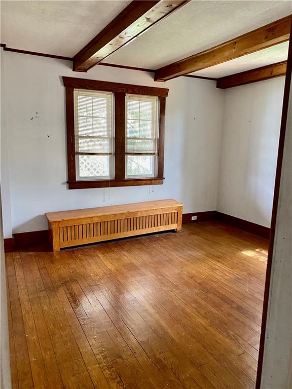 2410 Willowbrook Road Pittsburgh, PA 15241 - Photo 11 of 23 a view of an empty room with wooden floor and a window