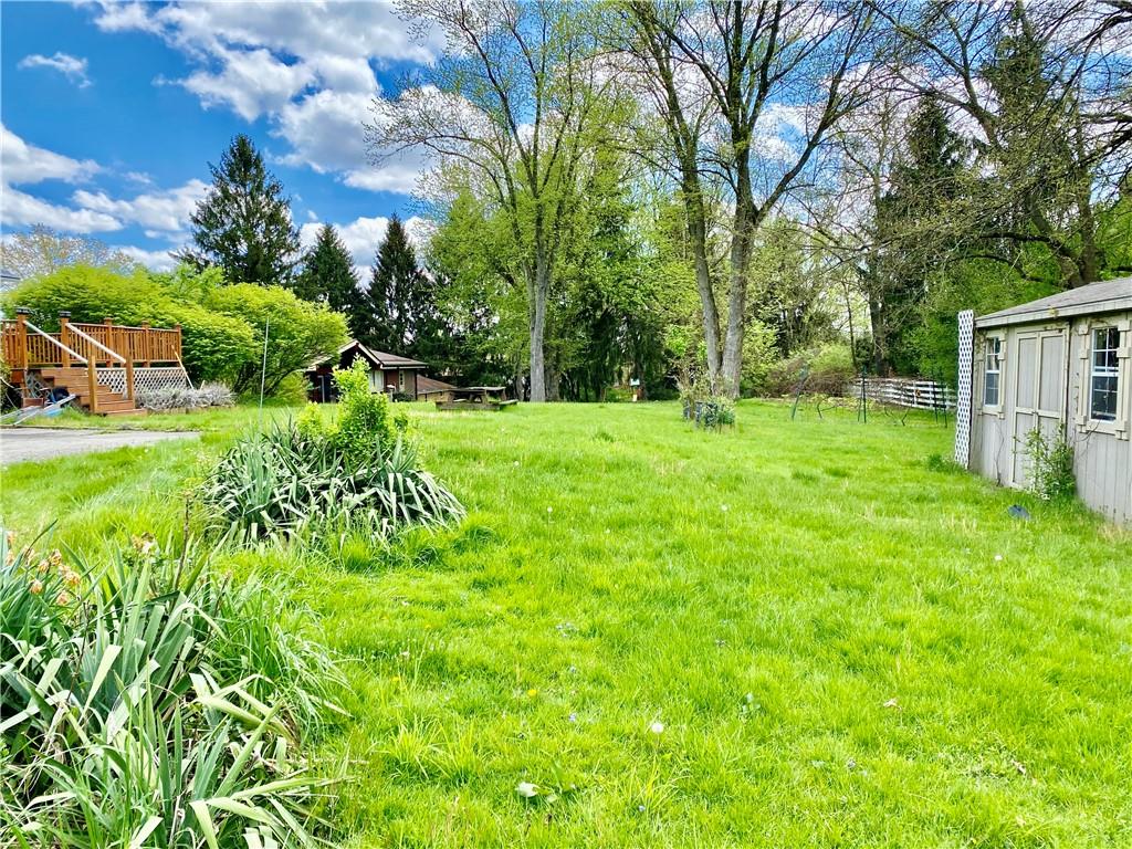 2410 Willowbrook Road Pittsburgh, PA 15241 - Photo 5 of 23 a view of a backyard with a garden