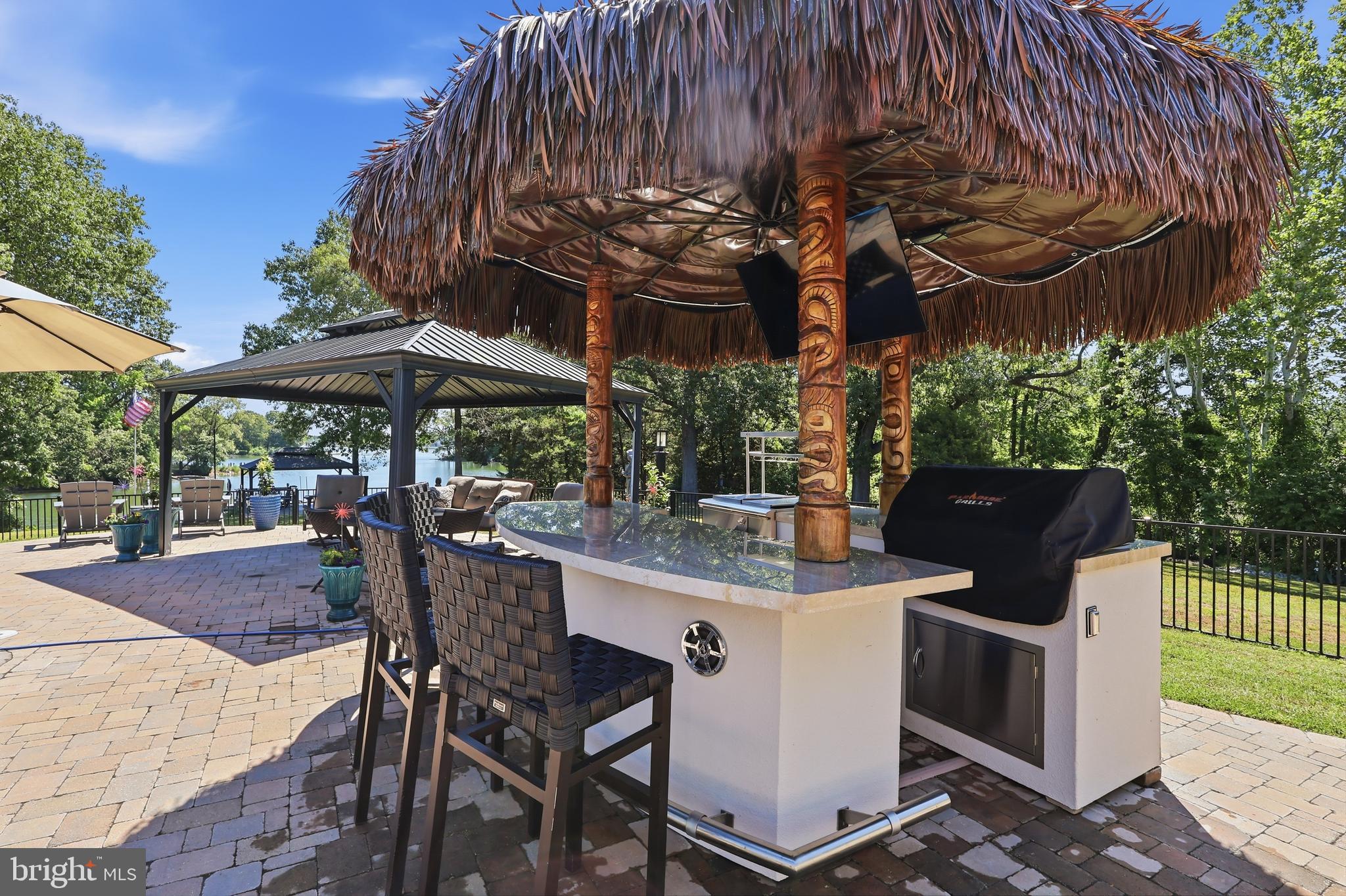 38980 Hodges Road Avenue, MD 20609 - Photo 78 of 98 Tiki bar w/grill, wine frig, frig, TV, sound sys