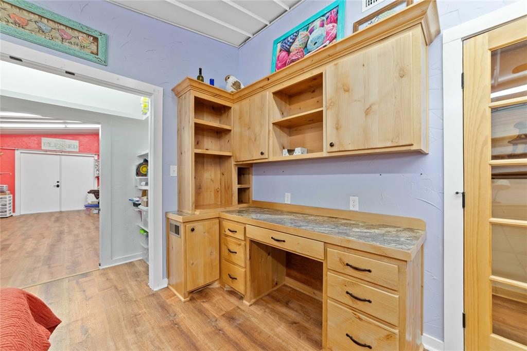970 County Road 256 Coleman, TX 76834 - Photo 16 of 35 a view of a kitchen with stainless steel appliances granite countertop cabinets and a window