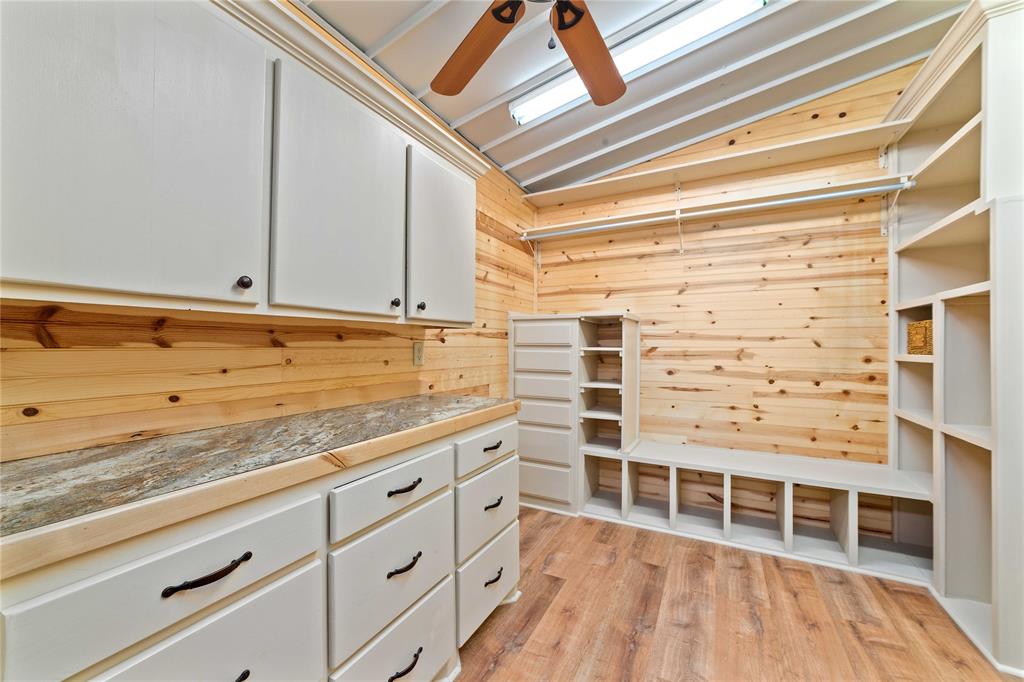 970 County Road 256 Coleman, TX 76834 - Photo 22 of 35 a view of wooden floor and cabinets