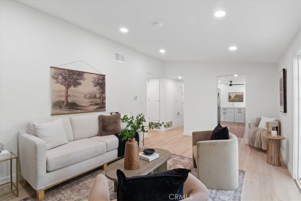 3093 Fish Canyon Road Duarte, CA 91010 - Photo 11 of 27 a living room with furniture and wooden floor