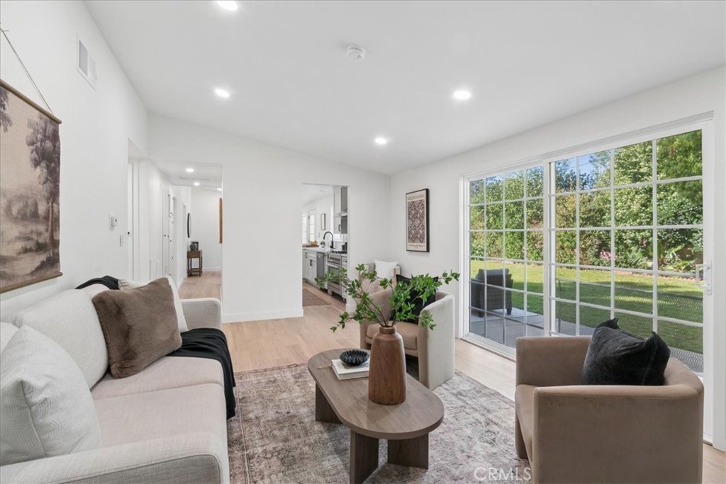 3093 Fish Canyon Road Duarte, CA 91010 - Photo 12 of 27 a living room with furniture and a potted plant