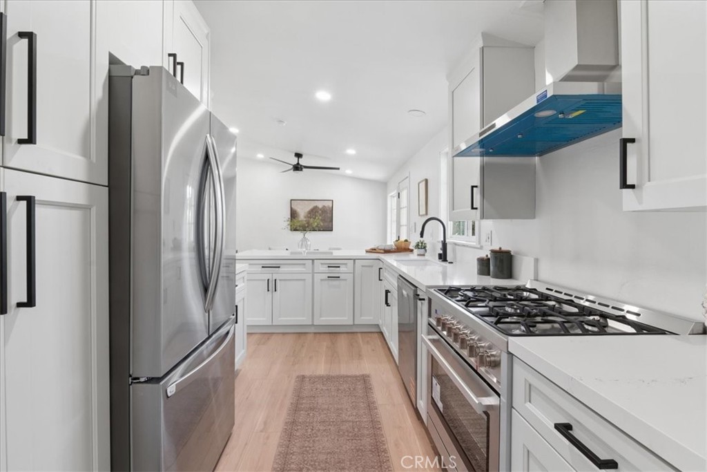 3093 Fish Canyon Road Duarte, CA 91010 - Photo 13 of 27 a kitchen with stainless steel appliances a refrigerator sink and stove