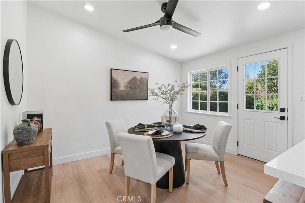 3093 Fish Canyon Road Duarte, CA 91010 - Photo 15 of 27 a dining room with furniture a window and wooden floor