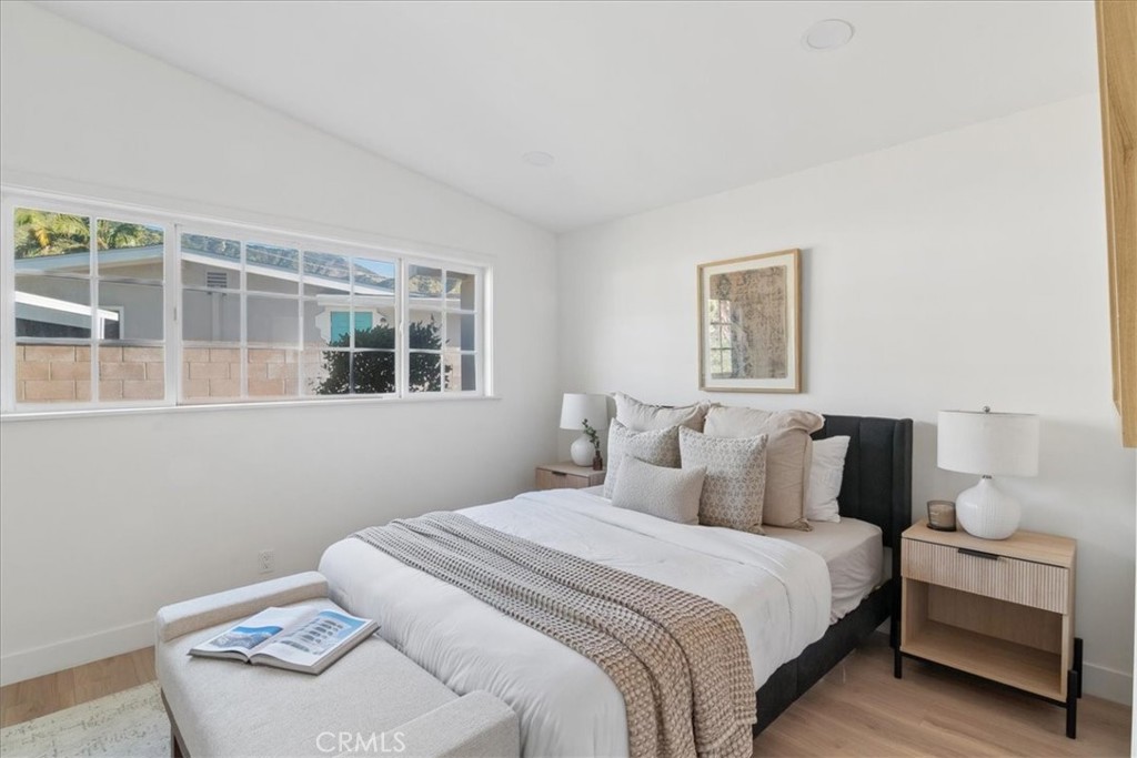 3093 Fish Canyon Road Duarte, CA 91010 - Photo 20 of 27 a bedroom with a bed and a window