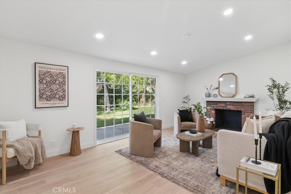 3093 Fish Canyon Road Duarte, CA 91010 - Photo 3 of 27 a living room with furniture and a fireplace