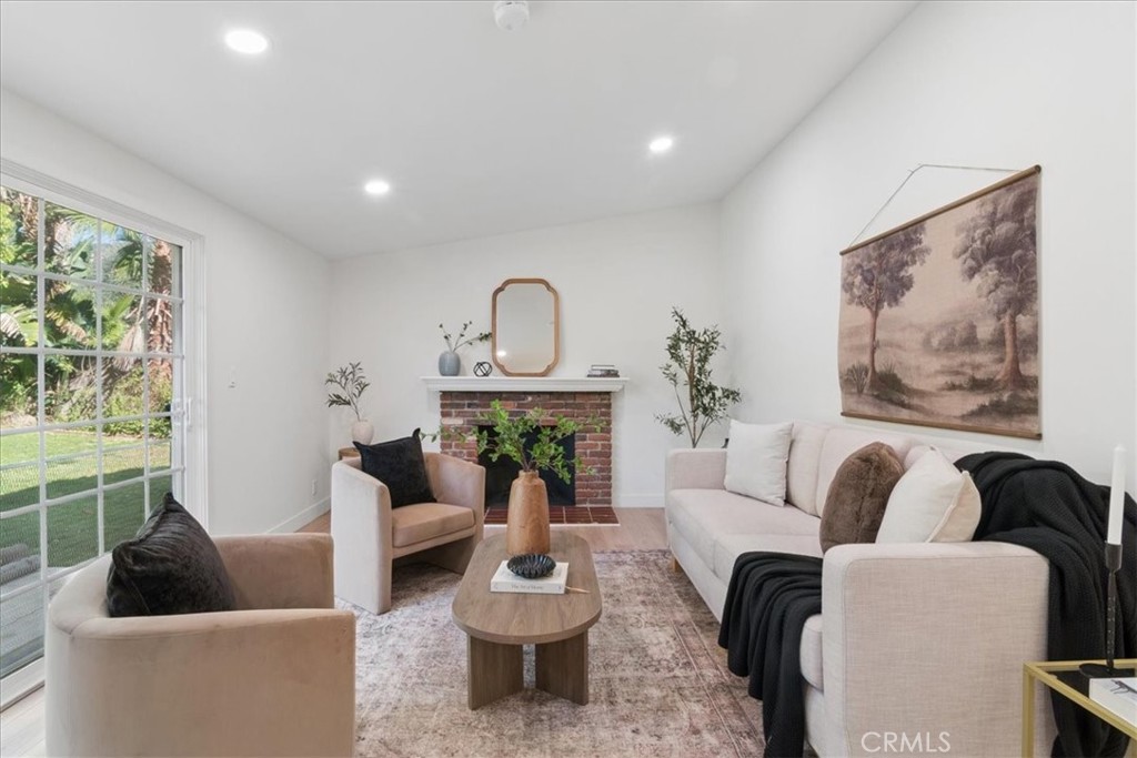 3093 Fish Canyon Road Duarte, CA 91010 - Photo 10 of 27 a living room with furniture and a painting on the wall