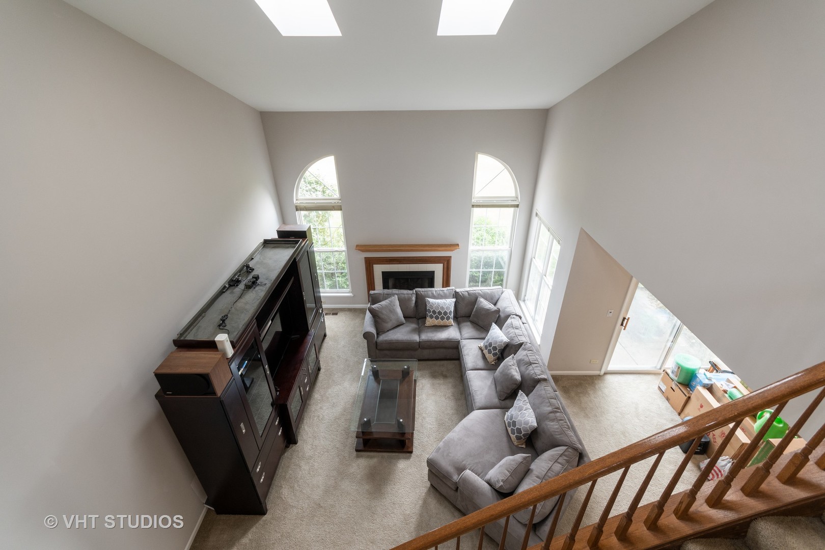 1234 Coldspring Road Elgin, IL 60120 - Photo 8 of 15 a living room with furniture fireplace and a flat screen tv