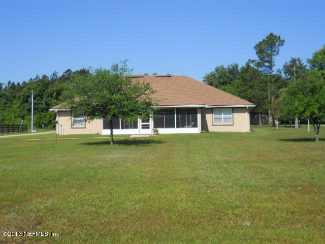 5313 Manning Cemetery Road Jacksonville, FL 32234 - Photo 7 of 51 Back home from mid-way backyard