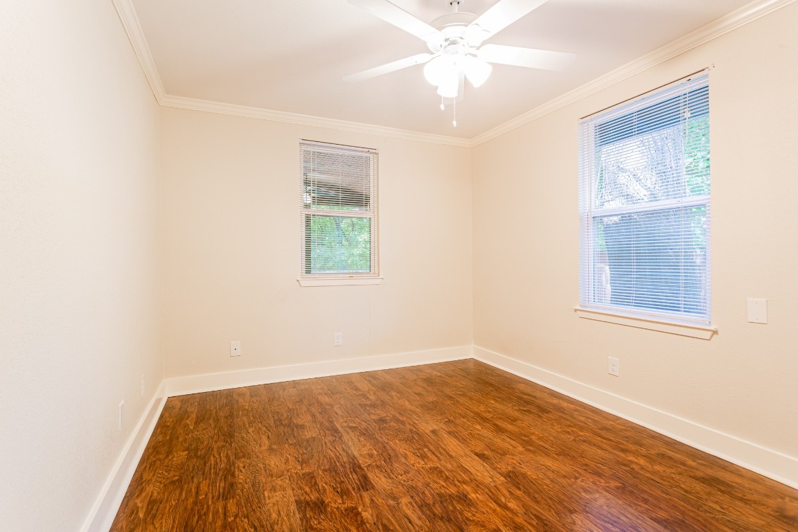 1909 Morrow Street, Unit B Austin, TX 78757 - Photo 9 of 16 an empty room with a window