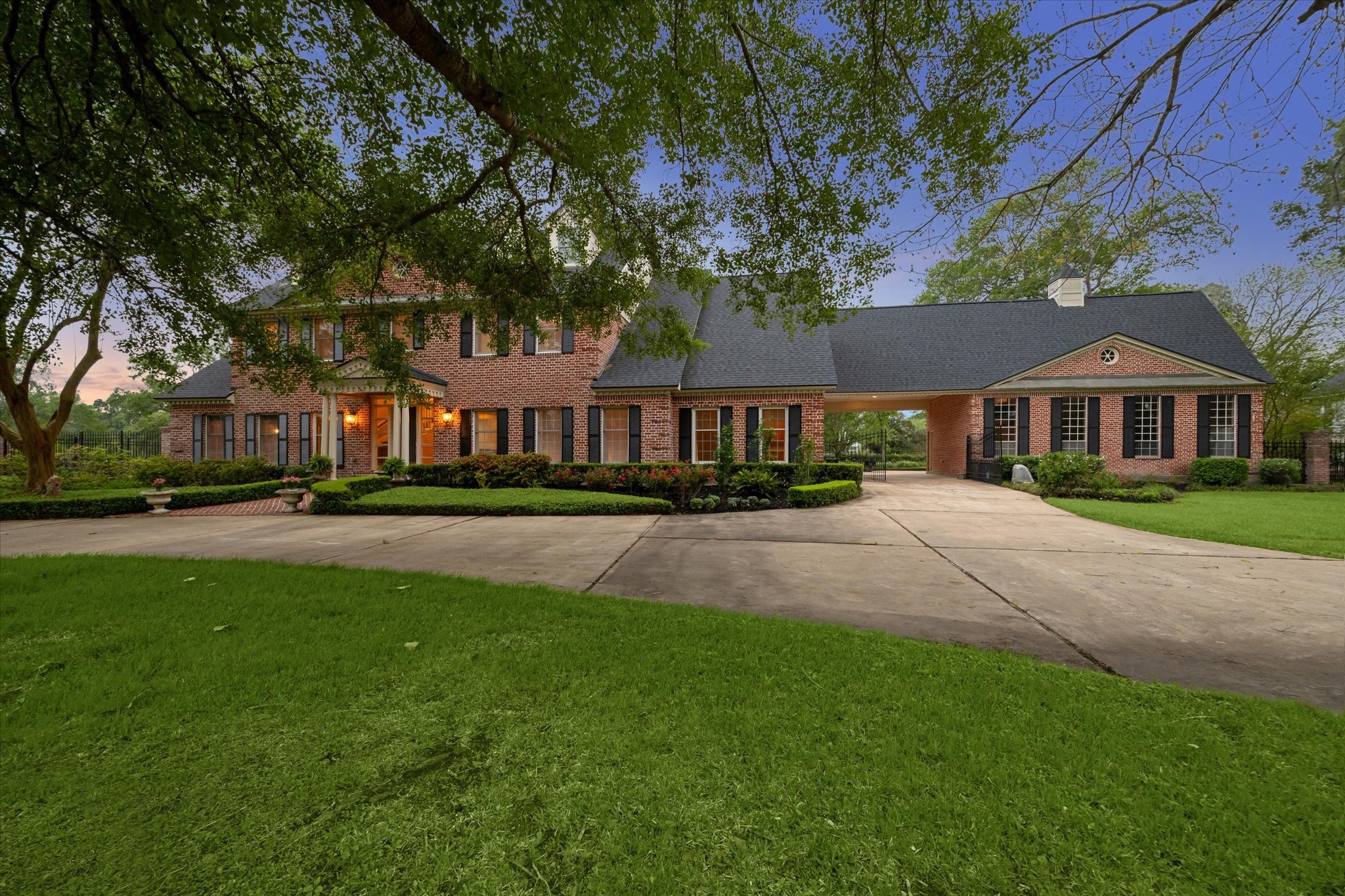 6611 Riva Ridge Drive Richmond, TX 77406 - Photo 3 of 46 Mature trees and a private gated entrance welcome you home.