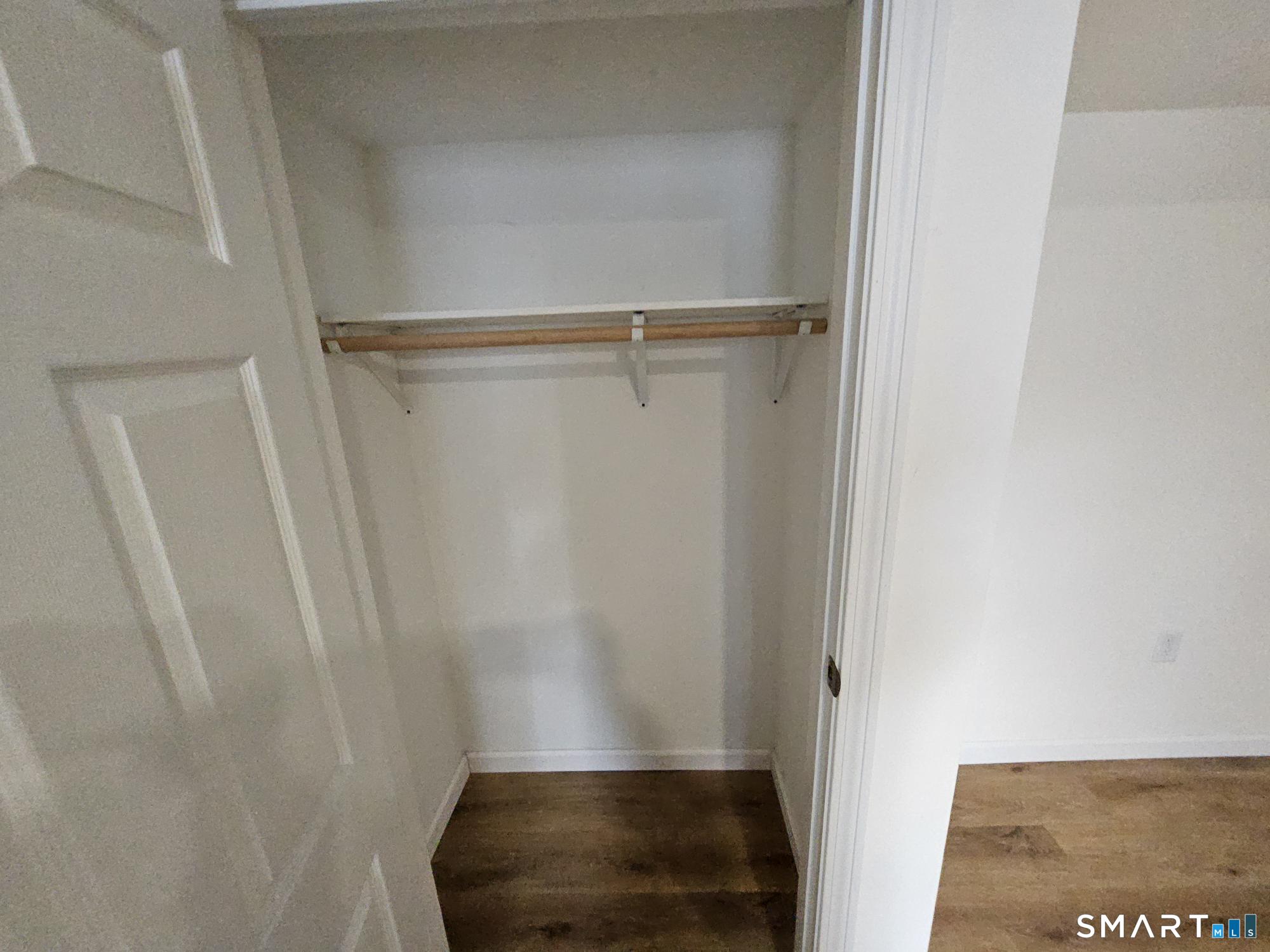 410 Main Street Southington, CT 06489 - Photo 7 of 7 a view of walk in closet with clothes