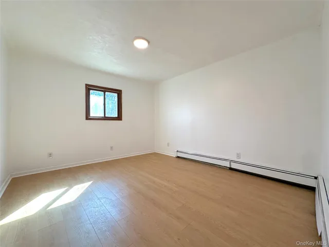 an empty room with a workbench
