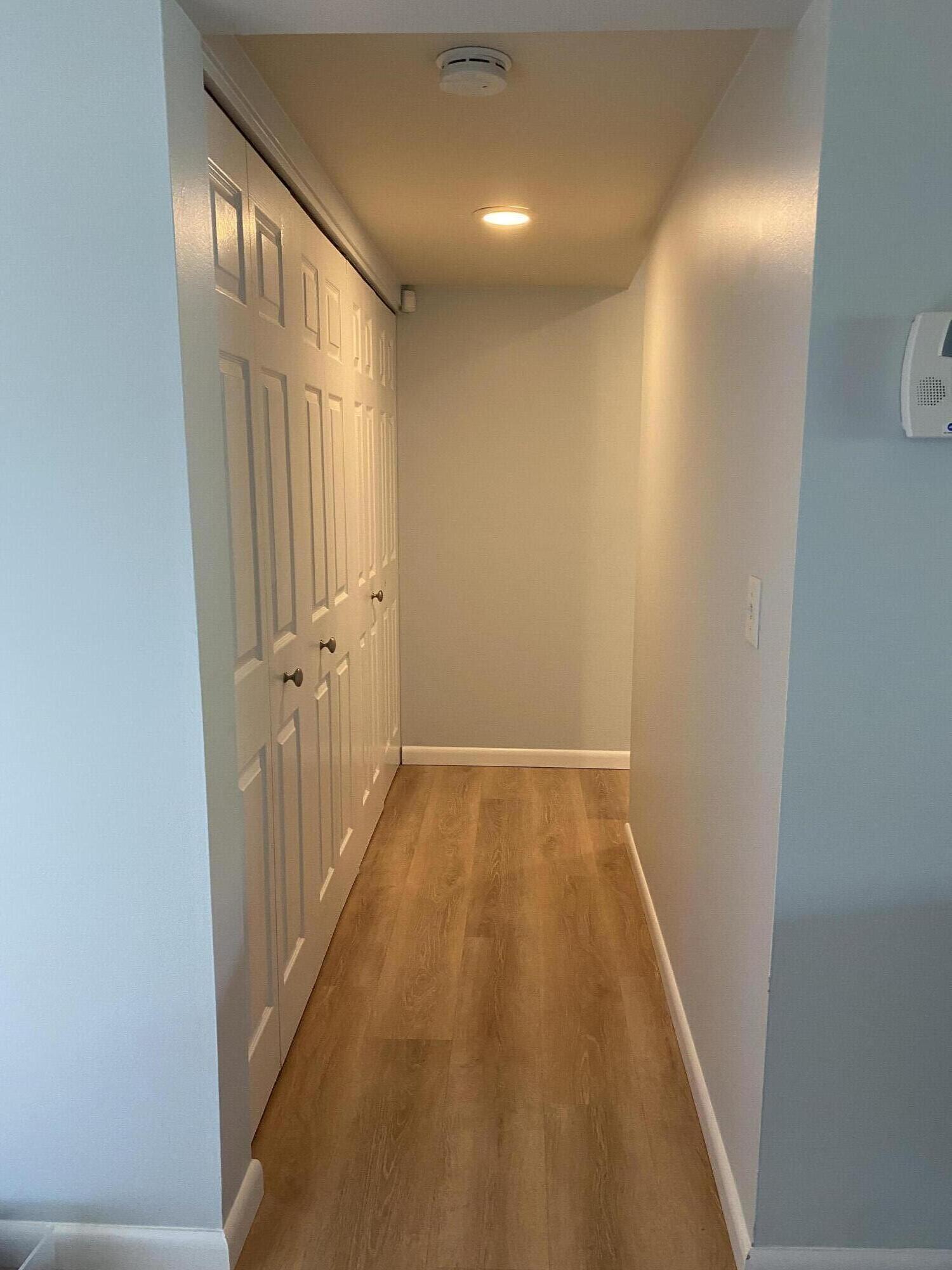 1325 South Maple Road, Unit 103 Ann Arbor, MI 48103 - Photo 8 of 26 Hallway with ample storage/closet space